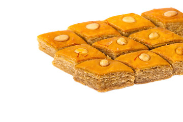Baklava on white background. Selective focus.