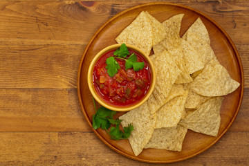 Chunky Salsa and tortilla chips. Selective focus.