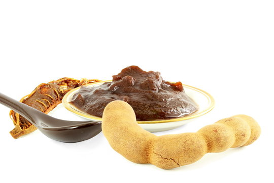 Tamarind With  Concentrate Chutney Pulp Or Paste On White Background