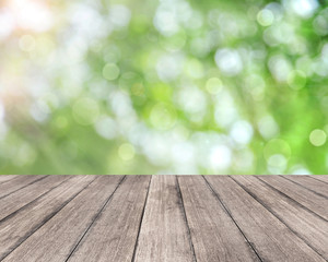 Naklejka na ściany i meble Wooden plank and bright spring bokeh background - can be used for display your products