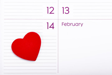 Red Wooden Heart On Calendar. February 14. Valentines Day Concept 