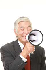 senior Japanese businessman with megaphone