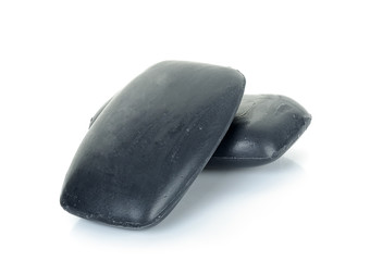 Black soap isolated on the white background