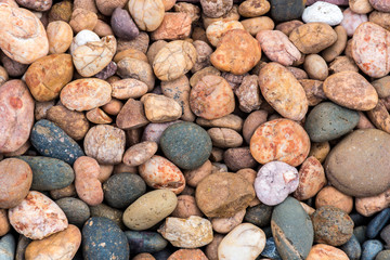 Sea stones background orange