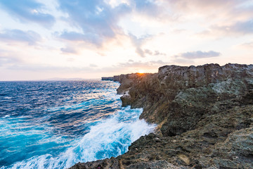 Sunrise, sea, cliffs, seascape. Okinawa, Japan.