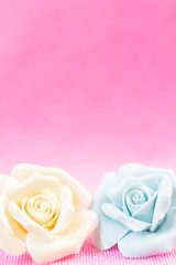 Pastel Rose (Ceramic ) on pink fabic background