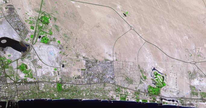 Aerial time lapse shows increase in vegetation and irrigation in Dubai, 2002-2011. 3 second head pad, 12 second time lapse, 3 second tail pad. 