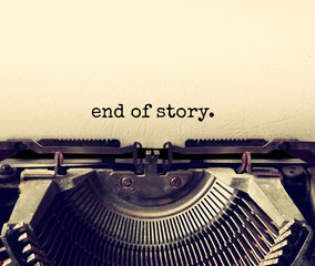 close up image of typewriter with paper sheet and the phrase: end of story. copy space for your...