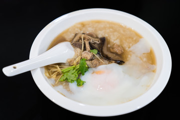 Rice porridge with pork egg and shiitake mushroom
