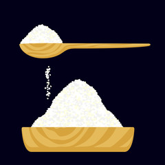 Granulated salt or sugar in a wooden bowl and in a wooden spoon.