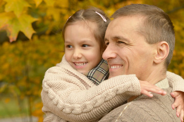 Father with daughter in  park