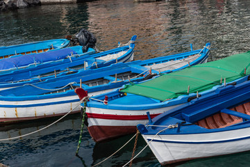 Small boats anchored in Sicily, Italy.