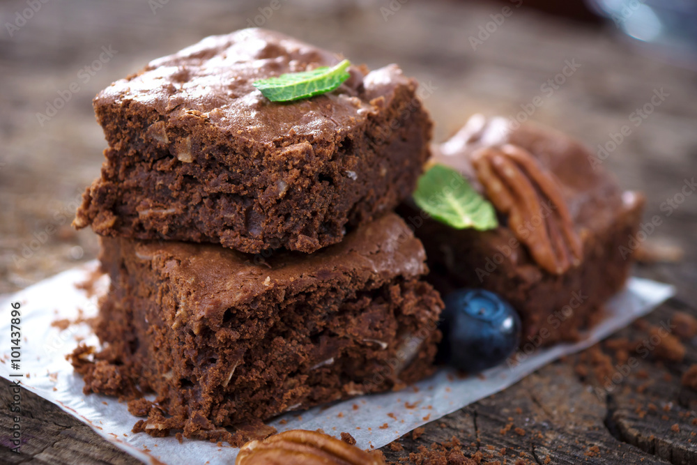 Wall mural brownies on wooden background