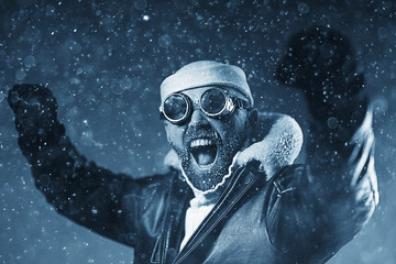 brutal portrait of a bearded man winter snow goggles