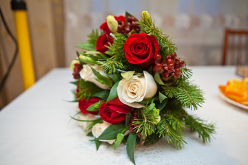 winter bridal bouquet of flowers and fir branches