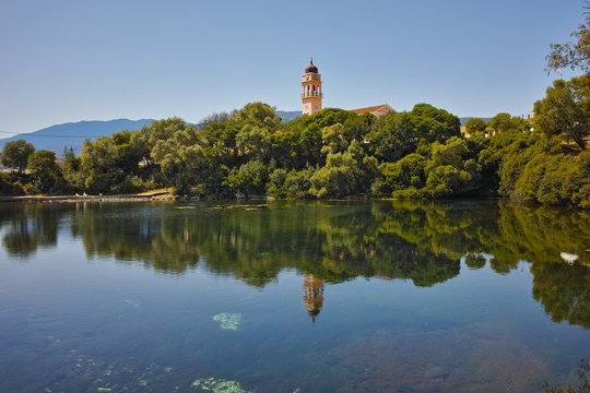 Reflection of church in karavomilos lake, Kefalonia, Ionian islands, Greece