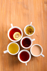 Obraz na płótnie Canvas Sorts of tea in the cups