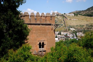 Fototapeta na wymiar View of the castle tower (Torre de los Picos), Alhambra Palace.