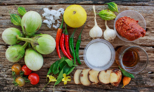 Ingredients for Thai spicy curry on the wooden floor
