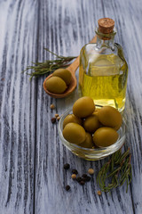Olives and bottle of olive oil