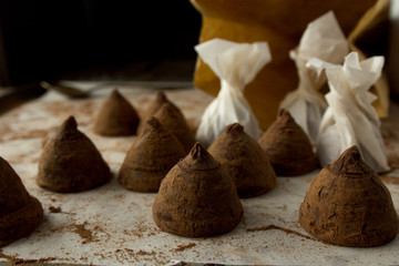 Chocolate truffles on cooking sheet closeup