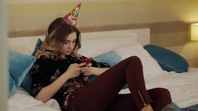 Sad Girl At A Birthday Party Reads The Message