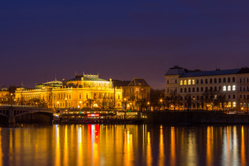 Fototapeta na wymiar Scenic view in night of the Old Town architecture over Vltava river in Prague, Czech Republic