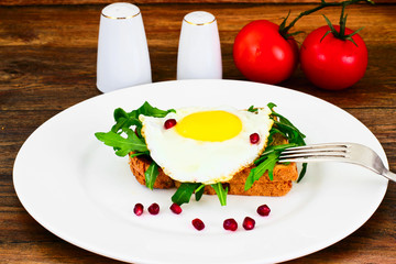 Scrambled Eggs with Arugula on Whole Grain Bread