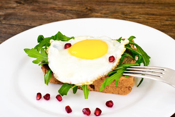 Scrambled Eggs with Arugula on Whole Grain Bread