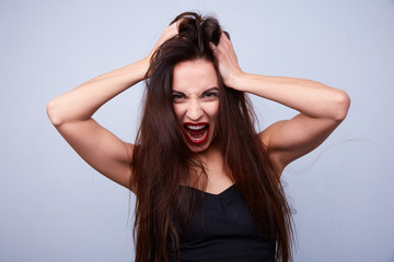 Fototapeta premium woman screaming and holding his head