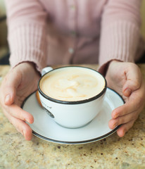 Cup of cappuccino, selective focus