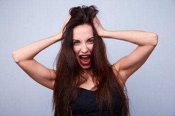 Fototapeta premium woman screaming and holding his head