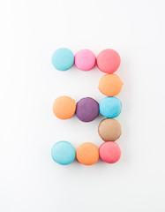 Fototapeta na wymiar colorful macarons arrangment is number three