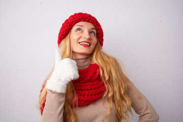 blonde in a red cap and scarf shows all is well