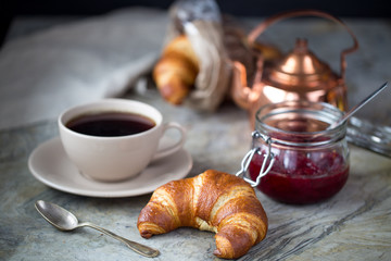 fresh croissants with jam for breakfast