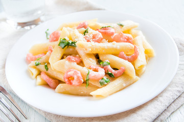 Penne pasta with shrimps, cream sauce