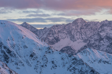 Colorful mountain sunset panorama at winter in High Tatras