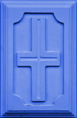 High resolution christian cross symbol in blue wooden background