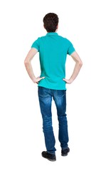 Fototapeta premium Back view of man in jeans