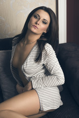 alluring woman on sofa