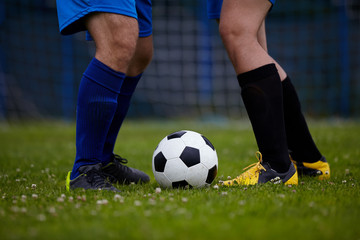 Soccer player legs in action 