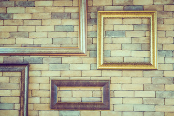 Empty photo frame on brick wall textures