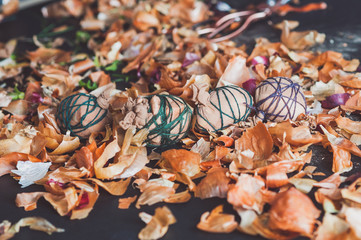 Stage of Preparation of Decor for Easter. Bio and Natural way of painted eggs with fresh leaves and onion shells.