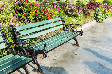 Green wooden chairs in the garden