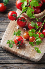 Fresh red tomato with green parsley