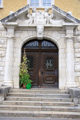 Fototapeta na wymiar School / Entrance to the Swiss school in Bruges