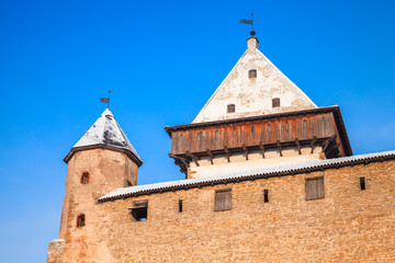 Fototapeta na wymiar Tower and walls of Herman castle in Narva. Estonia