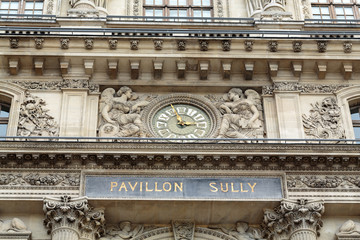 Paris -  Architectural fragments of Louvre building. Louvre Museum is one of the largest and most...