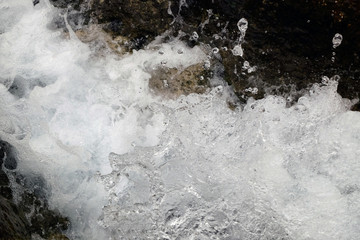 Water flowing from the stones