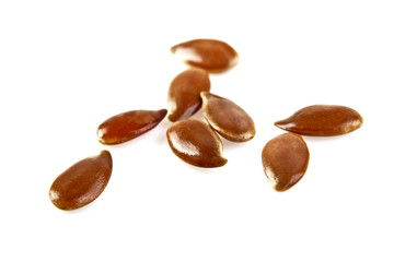 Close up of flax seeds isolated on white background